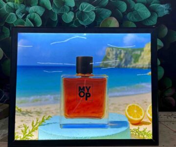 LED clip board display with illuminated beach perfume advertisement by Lumiere Sign Company Kerala