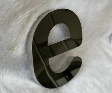 Premium silver mirror 3D letter signage with glossy metallic finish for luxury business branding and reception wall display